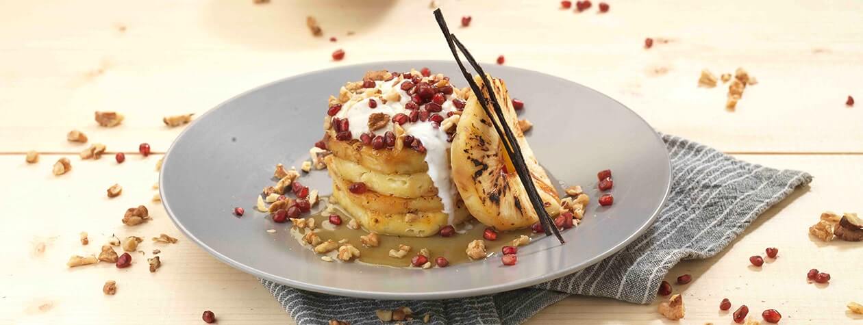 Grilled pineapple with honey & walnuts, served with vanilla yoghurt