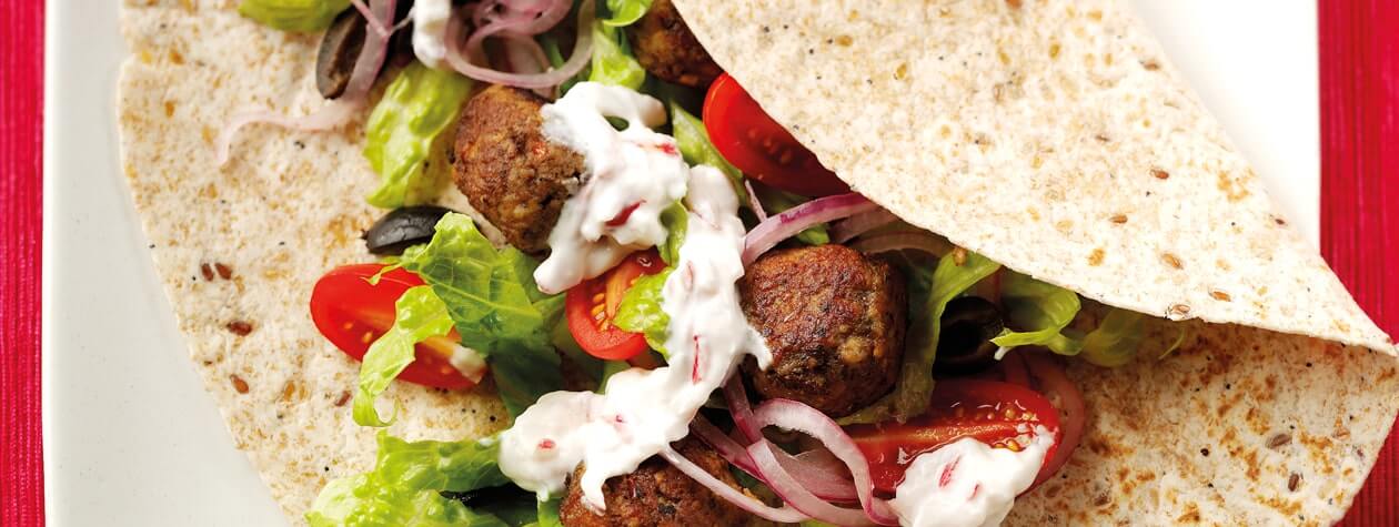 Greek Lamb Meatballs with Radish Tzatziki, Pickled Red Onion & Olives